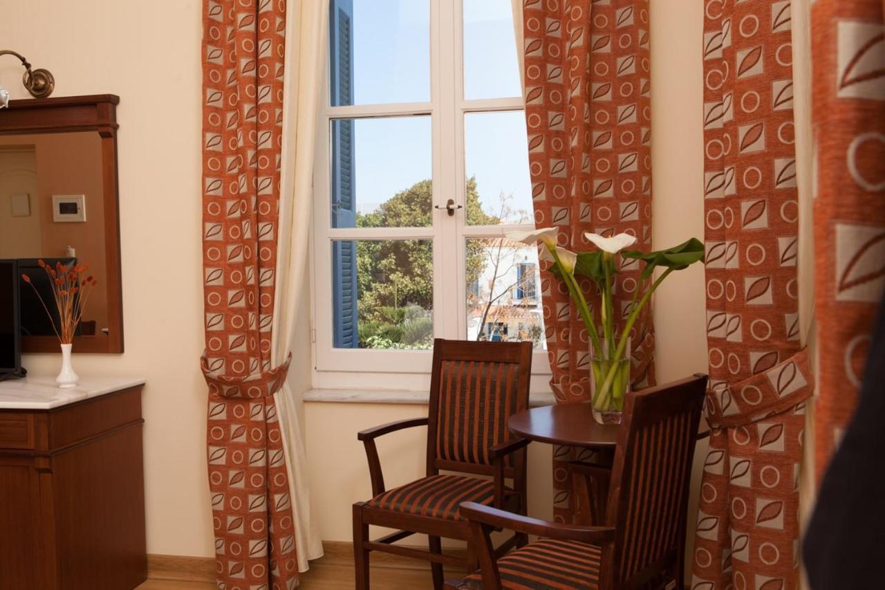 Egli Hotel Andros Town Bagian luar foto