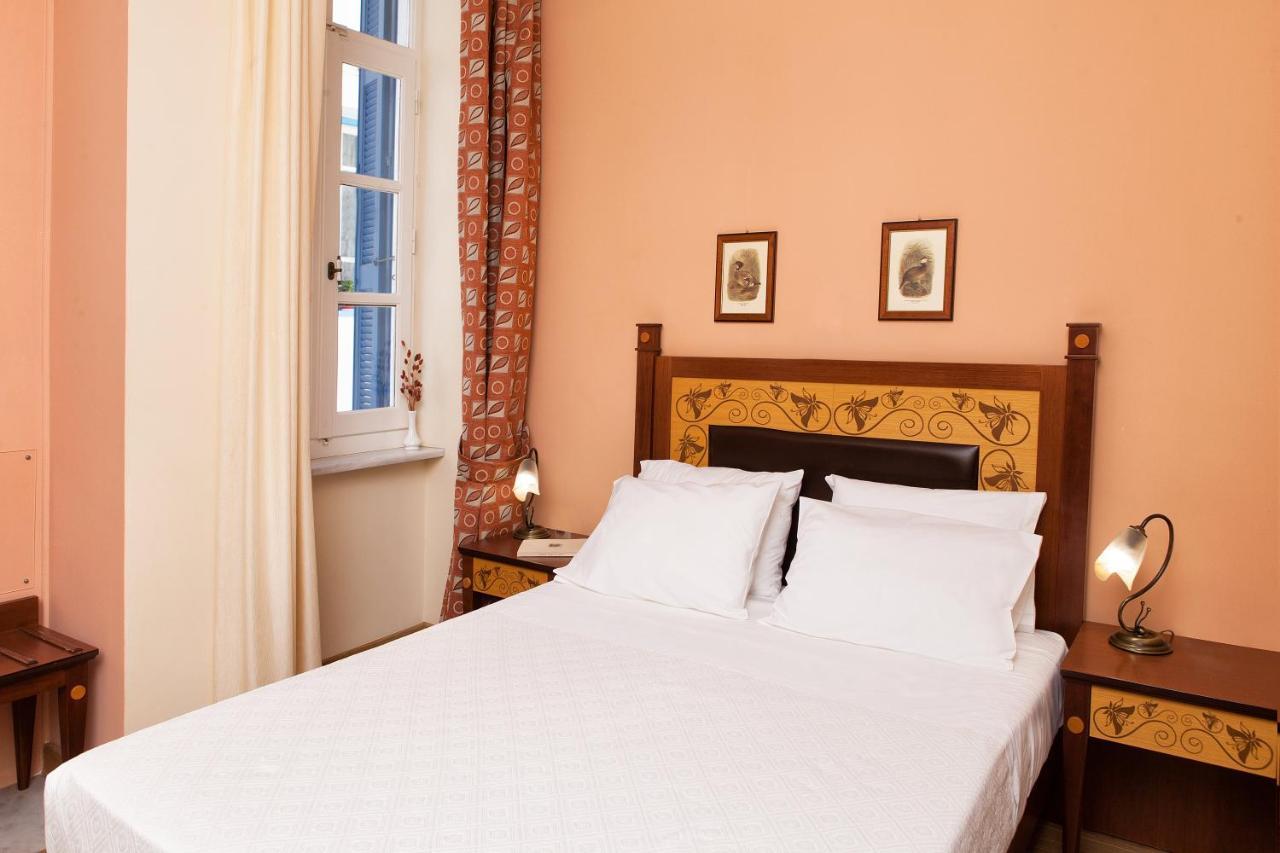 Egli Hotel Andros Town Bagian luar foto